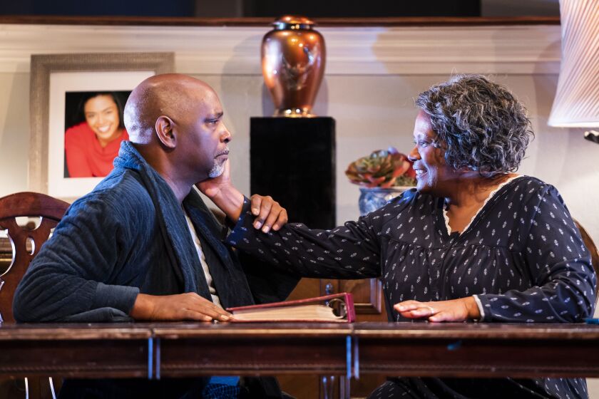 Pastor Jones (David Alan Anderson) must come to terms with the loss of a child and the Alzheimer’s disease that is stealing his wife Ruth (Celeste Williams) in “The First Deep Breath” at Victory Gardens Theater.
