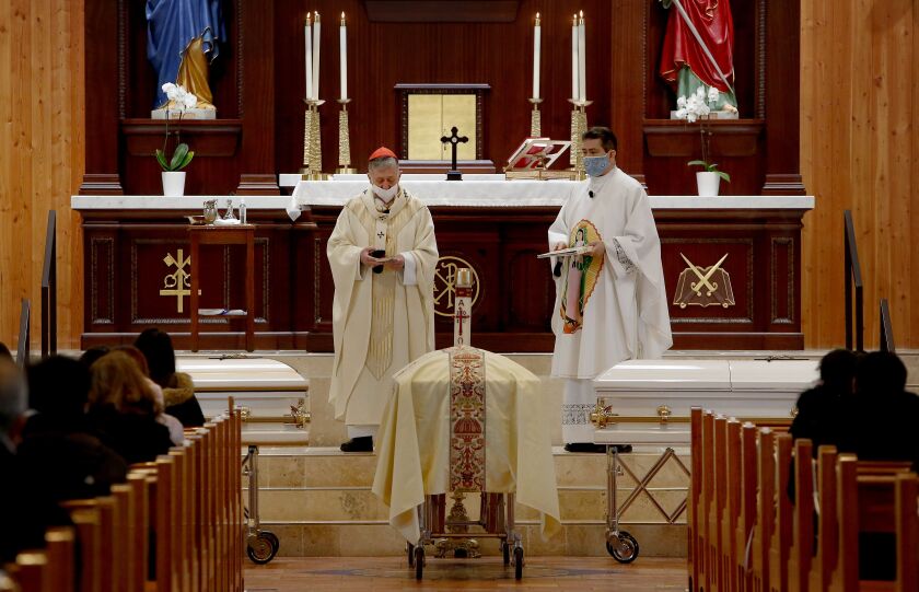 Cardinal Blase Cupich and the Rev. Esequiel Sanchez presided over the funeral Mass Wedneday for the four young girls and their mother killed in a Des Plaines house fire.