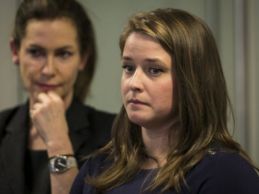 Lorna Brett (left) looks on as Alaina Hampton speaks during a news conference, outlining her complaints against Kevin Quinn, the longtime aide to House Speaker Mike Madigan, who she says made unwanted advances, Tuesday morning, Feb. 13, 2018. | Ashlee Rez