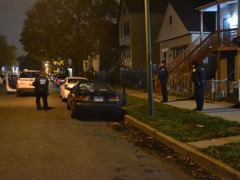 Police investigate a shooting about 12:30 a.m. Thursday, November 8, 2018 in the 4800 block of South Wolcott Avenue in Chicago. | Justin Jackson/ Sun-Times