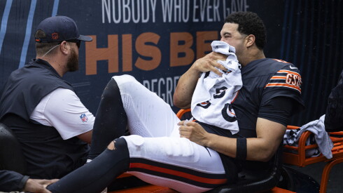 Chicago Bears quarterback Caleb Williams #18 is carted away with an injury during the second half against the Minnesota Vikings of an NFL football game at Soldier Field, Sunday, Sept. 20, 2026.