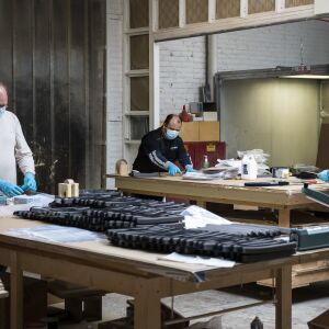 (From left) Steve Steier, Rene Ramirez and Juan Baez, all workers at Pac Team, can make at least 10 face shields in about 15 minutes at the factory at 4447 W. Armitage Ave. on the Northwest Side, Tuesday afternoon, March 31, 2020.