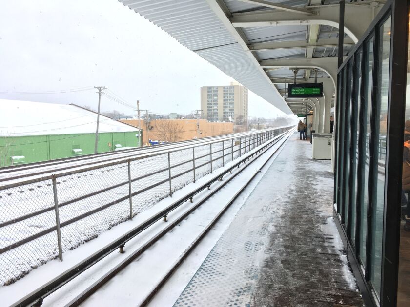 Snow covers the ground Feb. 6, 2020 at the Ridgeland Green Line stop in Oak Park.