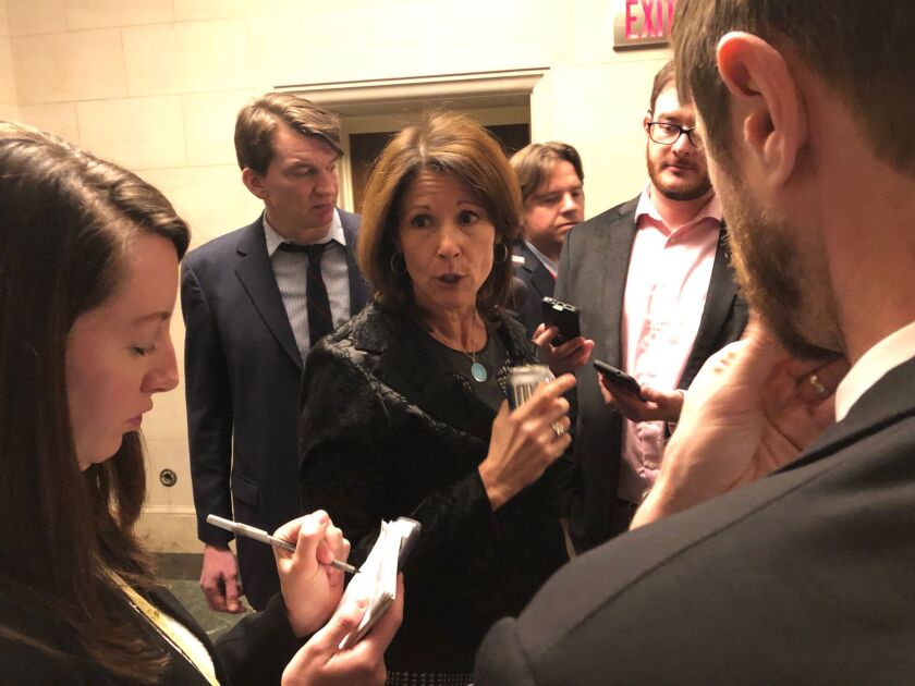 Rep. Cheri Bustos, D-Ill., who is running for DCCC chair, talks to reporters Tuesday, Nov. 27, 2018.