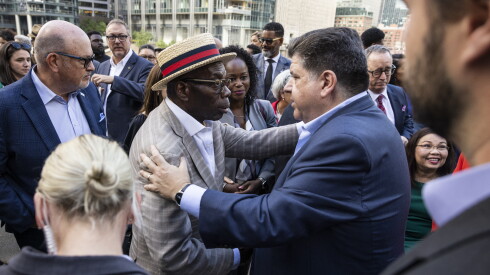 Wallace "Gator" Bradley (left) at a political event last year in downtown Chicago with Gov. JB Pritzker.