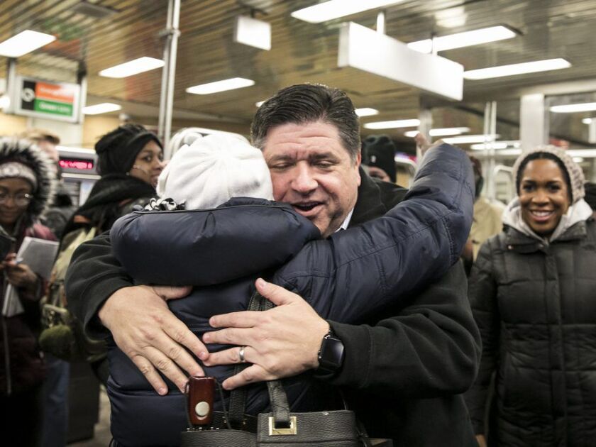 Governor-elect J.B. Pritzker greets voters at the CTA Roosevelt Station, Wednesday morning, Nov. 7, 2018. | Ashlee Rezin/Sun-Times