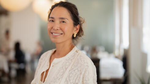 Heiji Choy Black, co-owner of Han Cha, stands at the artist-created Han Cha tearoom at Stony Island Arts Bank in South Shore, Friday, Aug. 7, 2026.