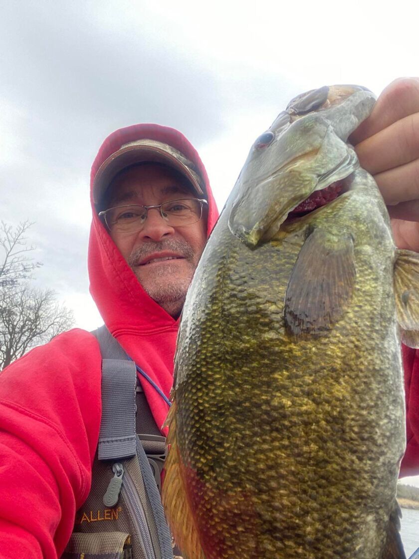 Larry Narro with a good smallmouth bass from the DuPage River. Provided photo