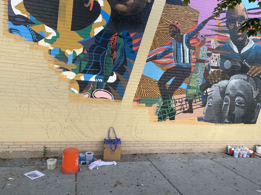 Part of the mural wall after it was partially painted over.