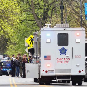 Police officers work the scene outside Endeavor Health Swedish Hospital in Lincoln Square.