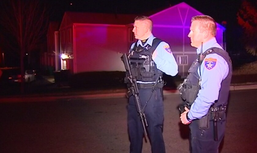 Police investigate in the 400 block of Meadow Green Lane in Round Lake Beach, where a person was shot Monday night. | Network Video Productions