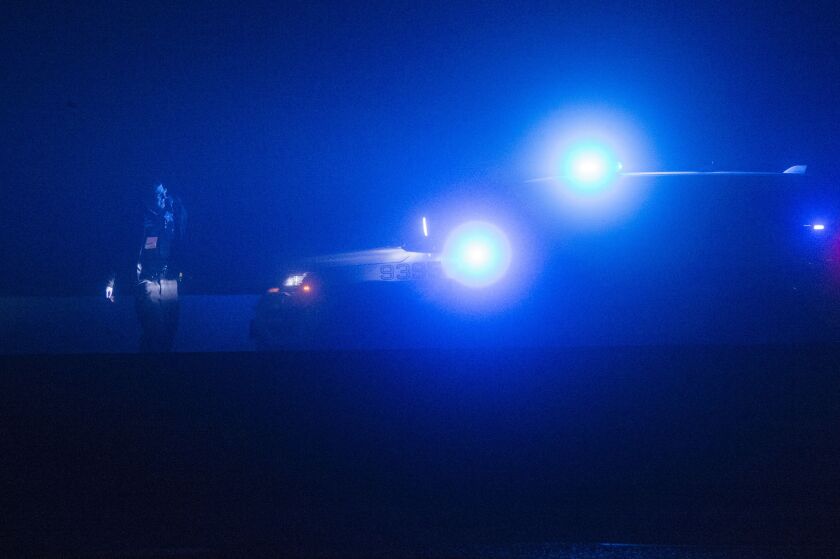 Chicago Police officers investigate the scene of a shooting in the northbound lanes of the 800 block of North Lakeshore Drive. | Tyler LaRiviere/Sun-Times