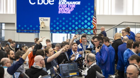 Traders work in the S&P options pit at Cboe Global Markets' offices in the Loop.