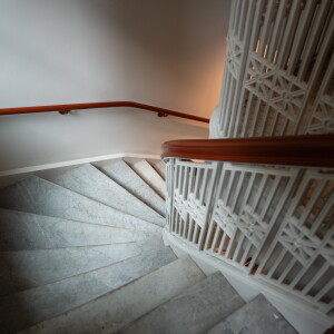Looking down the staircase, original to the 1905 property, inside the Bellwether Residences in the Loop.