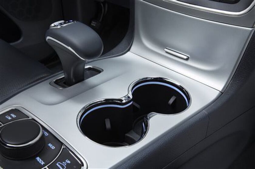 <small><strong> The gear shift in a 2014 Jeep Grand Cherokee Overland. | Fiat Chrysler Automobiles</strong></small>