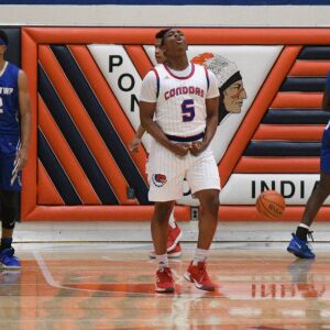 Curie’s Trevon Hamilton (5) celebrates after hitting a shoot against Bloom, Saturday 12-29-18. Worsom Robinson/For Sun-Times