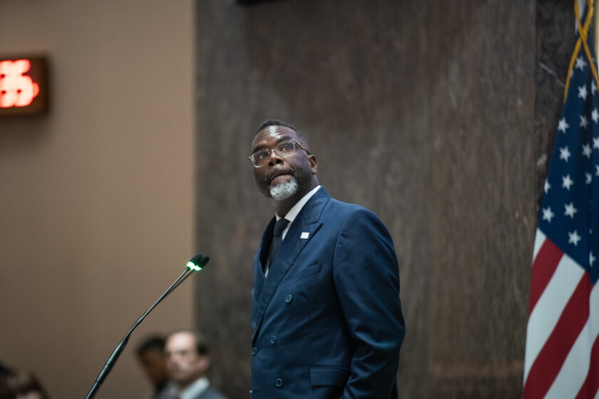 Mayor Brandon Johnson checks screens during a City Council vote at City Hall in the Loop, Wednesday, July 15, 2025.