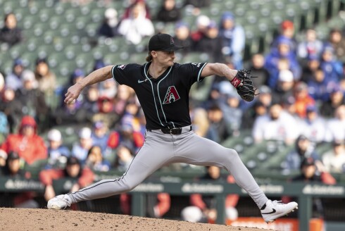 The Diamondback's Shelby Miller delivers a pitch in the ninth inning against the Cubs at Wrigley Field on April 20, 2025.