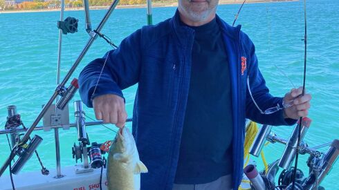 Chris Stromidlo with a smallmouth bass caught while trolling on the Many Times 2. Provided by Tom Palmisano