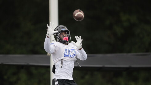 St. Francis’ Tivias Caldwell Jr. (42) looks to catch a pass during football practice.