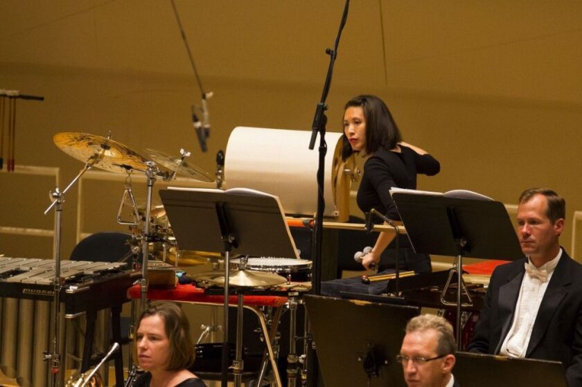 Cynthia Yeh, principal percussionist of the Chicago Symphony Orchestra, plays a wind machine as part of Mason Bates’ “Anthology of Fantastic Zoology.” (Photo: Todd Rosenberg)