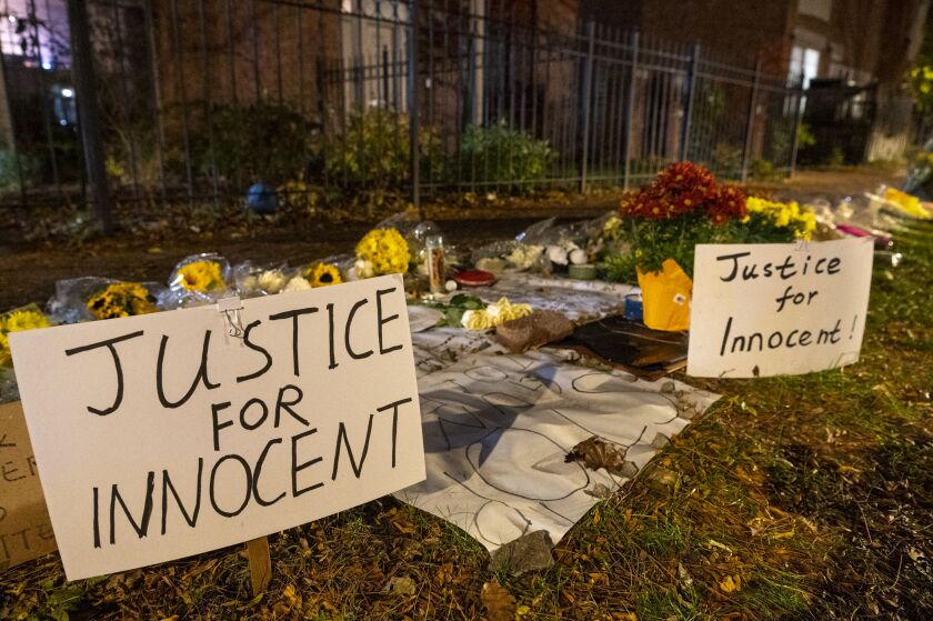 A memorial for University of Chicago graduate Shaoxiong “Dennis” Zheng is set up at the 5400 block of S. Ellis Ave. in the Hyde Park Neighborhood, Friday, Nov. 12, 2021.