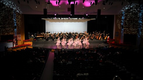 The Evanston Dance Ensemble performs the "Waltz of the Flowers" from The Nutcracker, on stage with the Evanston Symphony Orchestra during the "A Very Special Concert" at Evanston Township High School on Sunday, Dec. 14, 2025.