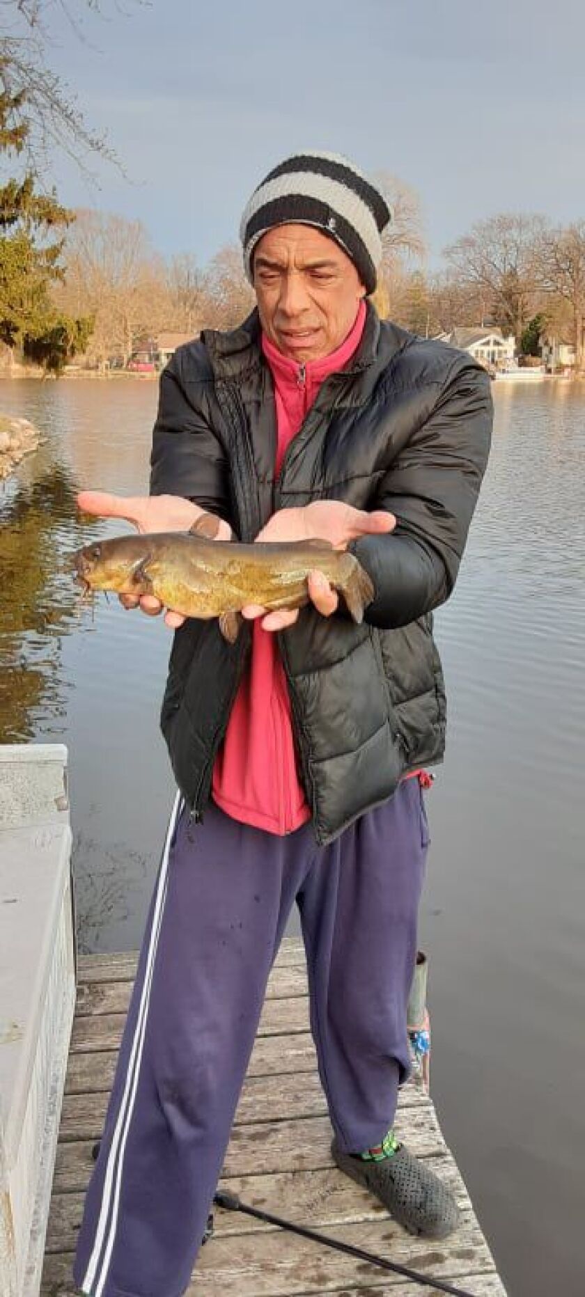 Rob Abouchar with a bullhead caught on Island Lake. Provided photo