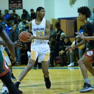 Simeon’s Andre Casey Jr. (23) looks for an open player, Thursday 01-24-19. Worsom Robinson/For the Sun-Times.