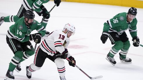 Max Domi passes the puck.