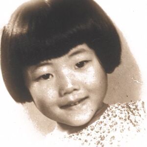 Linda Yu and her family immigrated to the U.S. when Linda was four years old. Linda’s passport photo. | Linda Yu Family Photos