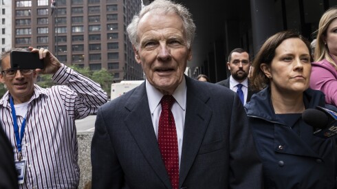 Michael Madigan walks out of the Dirksen Federal Courthouse.