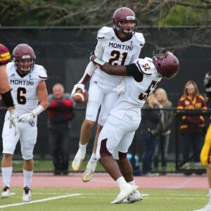 Montini’s Nate Muersch (21) and Jeremiah Banks-Wall (52) celebrate. Allen Cunningham/For the Sun-Times.