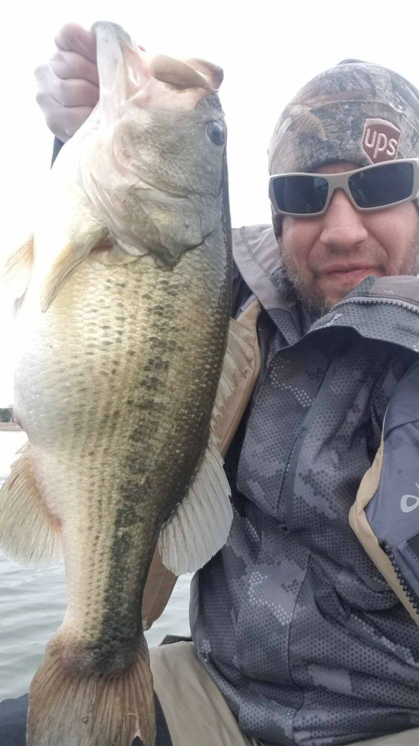 Eric Stark with a big largemouth bass caught while kayak fishing. Provided photo.