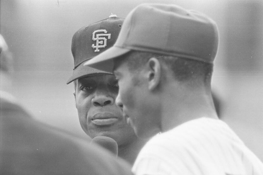 Ernie Banks interviews Willie Mays on radio in 1971. | Sun-Times Media