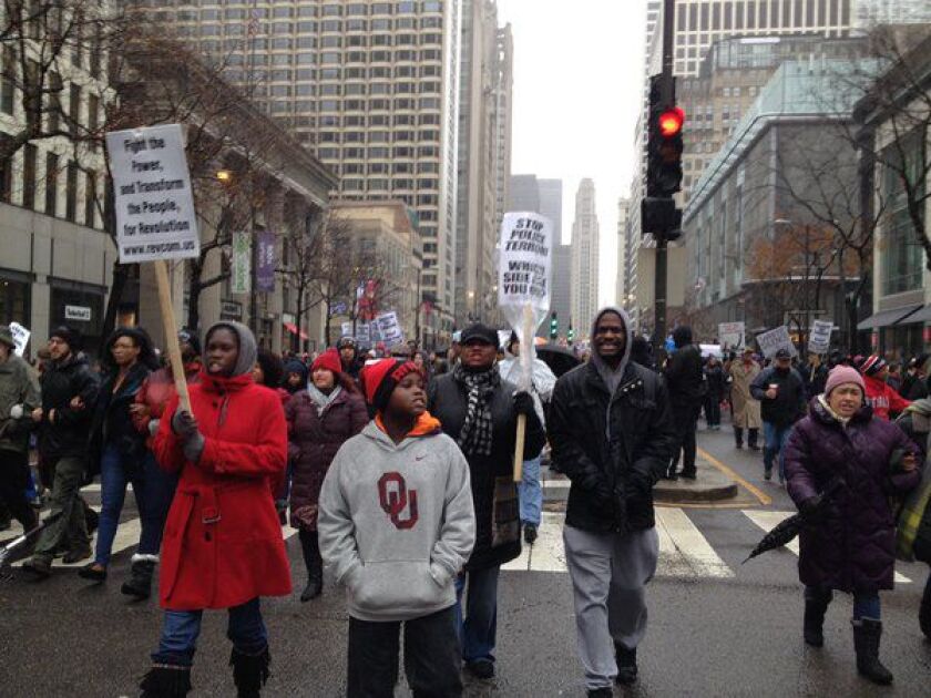 Laquan McDonald protesters Genean Stuttley, her 9-year-old son Joshua Collins, her mother, Gwen Stuttley and her brother, Henry Stuttley / Lauren FitzPatrick