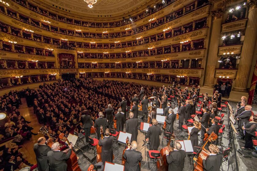 The Chicago Symphony Orchestra and maestro Riccardo Muti take in the ovation from a sold-out audience at Teatro alla Scala in Milan, Italy, on Jan. 20, 2017. The CSO is in the midst of its 2017 European tour. | © Todd Rosenberg Photography 2017