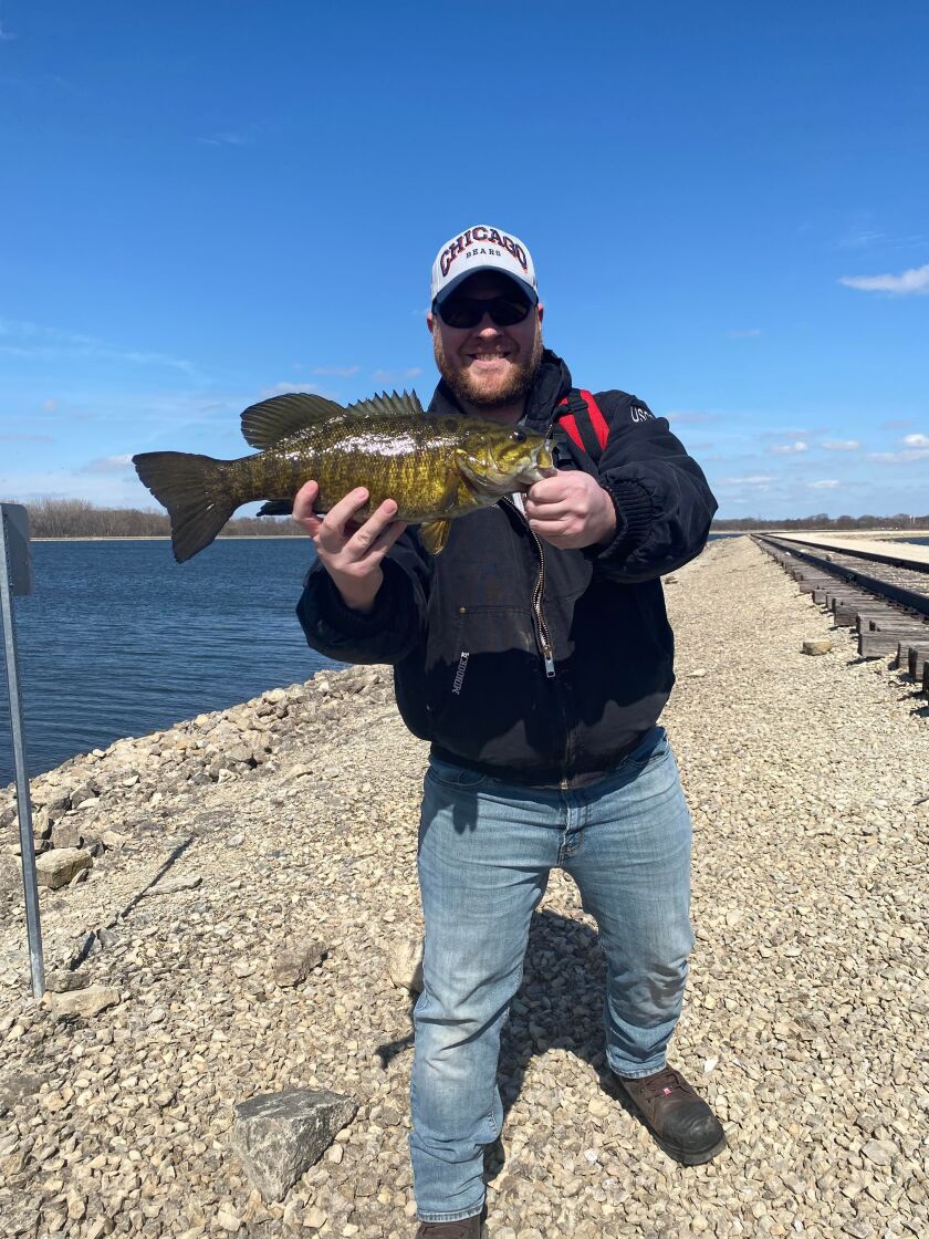 Jon Overton with a good smallmouth bass on opening weekend at Heidecke Lake. Provided photo