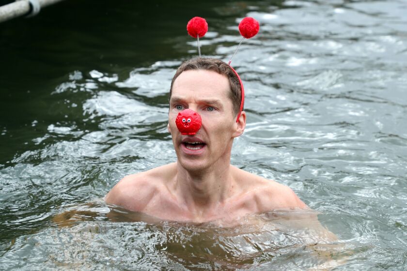 Actor Benedict Cumberbatch supports Red Nose Day by swimming in cold water for Mental Health programs on March 15, 2019 in London, England.