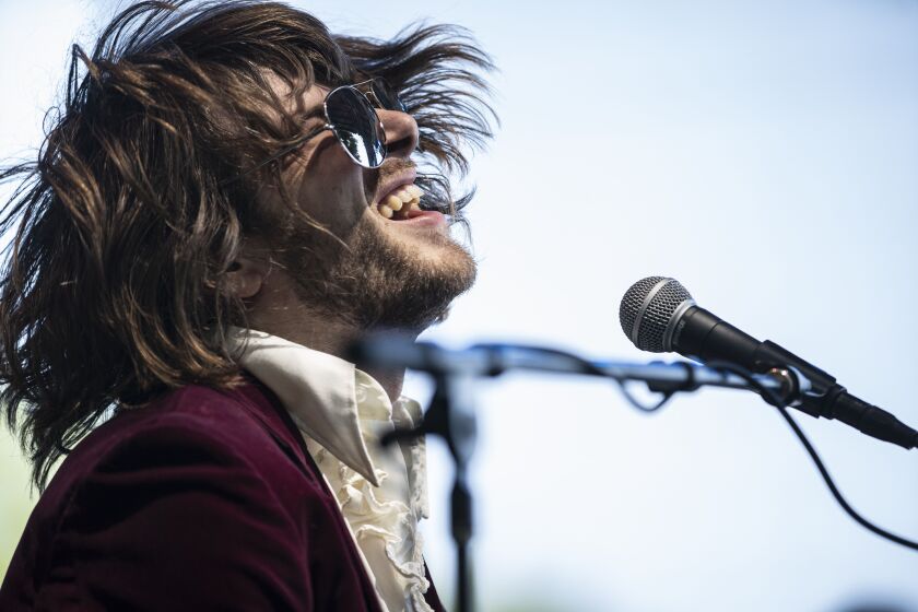 Neal Francis performs on day four of Lollapalooza in Grant Park.