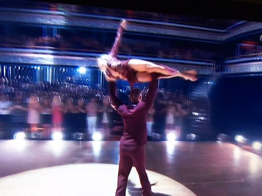 The judges were all nerves as David Ross attempted this very difficult lift of his partner Lindsay Arnold during their tango on Monday night’s “Dancing with the Stars” week six competition. | Miriam Di Nunzio/via ABC