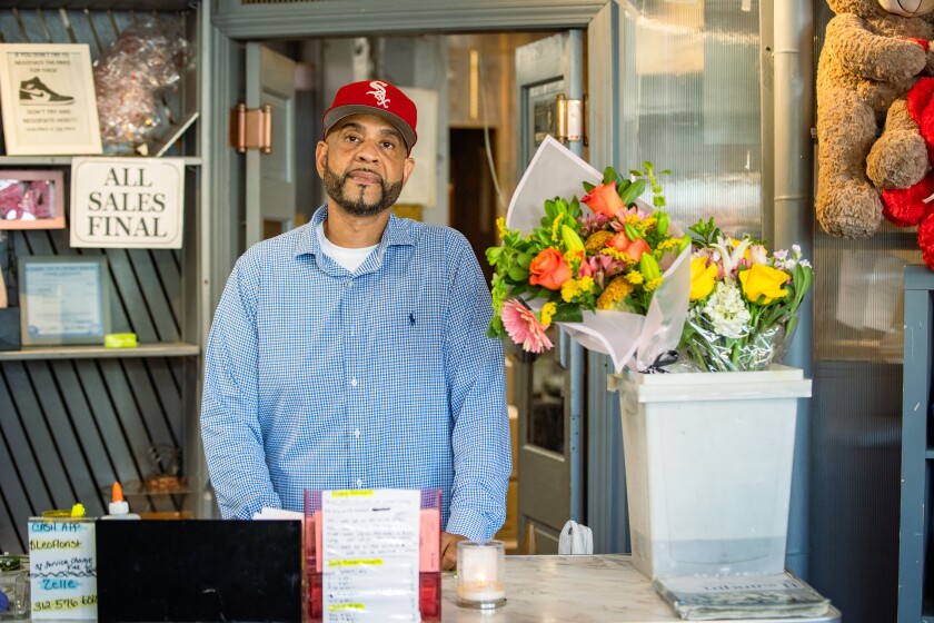 Marek Fortineaux, Proprietor of Leo's Metropolitan Florist, Stands Bebind the Register in His Shop, at 407 E. 71st St., On Thursday, Aug. 28, 2025 .. | Zubaer Khan/Sun-Time