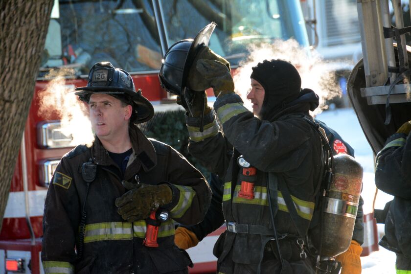 Firefighters put out a house fire Wednesday afternoon in the South Side Calumet Heights neighborhood. | Brian Jackson/ Sun-Times