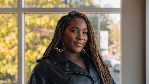 President of the Black Arts & Culture Alliance of Chicago, Charlique C. Rolle, poses for a portrait inside the Black Ensemble Theater.