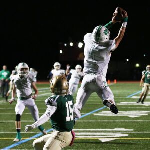 Notre Dame’s Ty Gavin grabs his second interception of the night against St. Patricks, River Grove, Illinois, October 6, 2018. | Allen Cunningham / for Chicago Sun Times