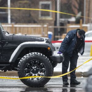 Chicago police investigate the scene where an off-duty Chicago police officer was shot in the 8900 block of South Stony Island Ave. in Calumet Heights, Monday, March 15, 2021.