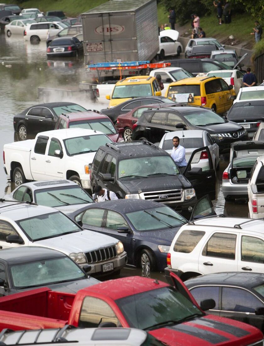 <small><strong>Motorists are stranded along I-45 along North Main in Houston after storms flooded the area, Tuesday, May 26, 2015. Overnight heavy rains caused flooding closing some portions of major highways in the Houston area. | Cody Duty / Houston Ch
