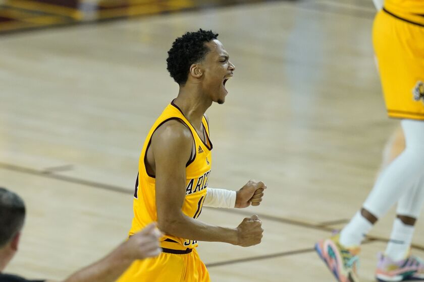 Arizona State guard Alozo Verge Jr. shouts after drawing a foul against UCLA during the first half of an NCAA men’s college basketball game.