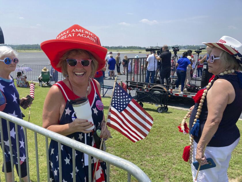 Jan Plemmons, of Columbus, Ga., waits at a private airfield for former President Donald Trump’s arrival in Georgia on Saturday, June 10, 2023.