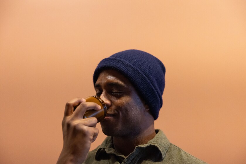 Terrell Boykin with his Inspire Natural Goods candles